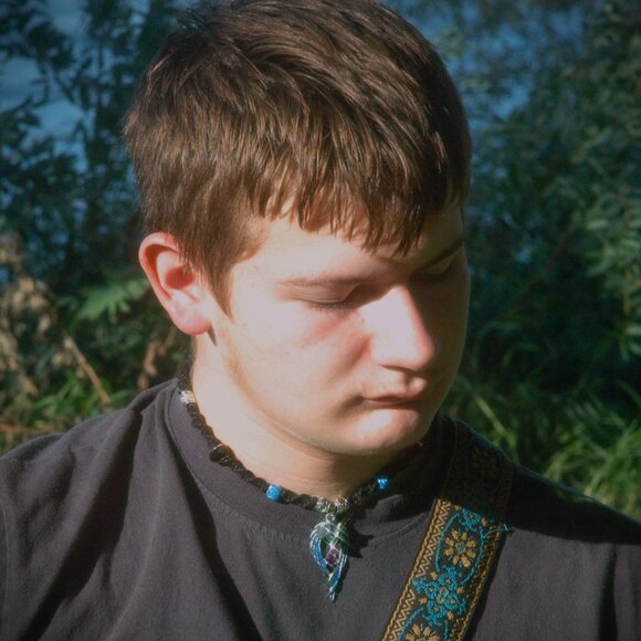 Dynamic Blue Glow in the Dark Wolf on a 17" Black Handmade Hemp Necklace - Picture 3 of 6